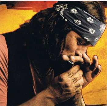 CD Eric Lindell: Low On Cash, Rich In Love