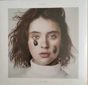 LP Pomme: À Peu Près